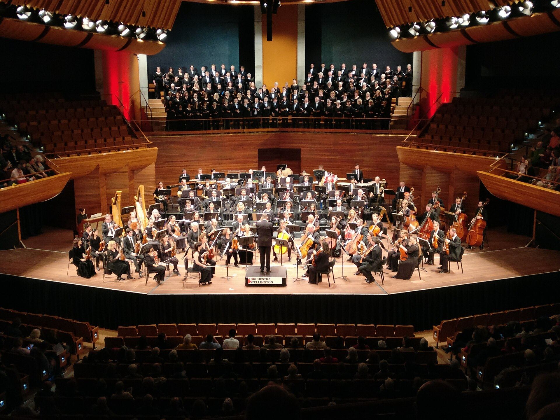 A symphony orchestra performing in a concert hall